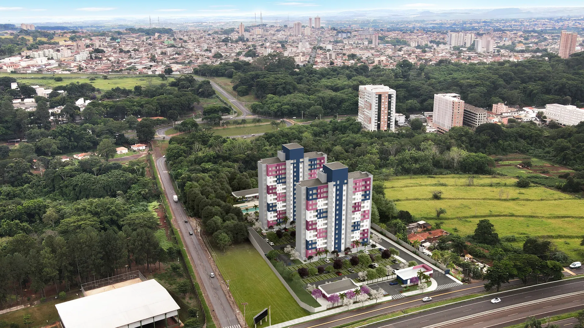 Vista aérea do Square Residencial: duas torres nas cores azul, rosa e cinza ao lado da USP, em Ribeirão Preto